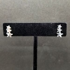 Silver cascading star earrings ⭐